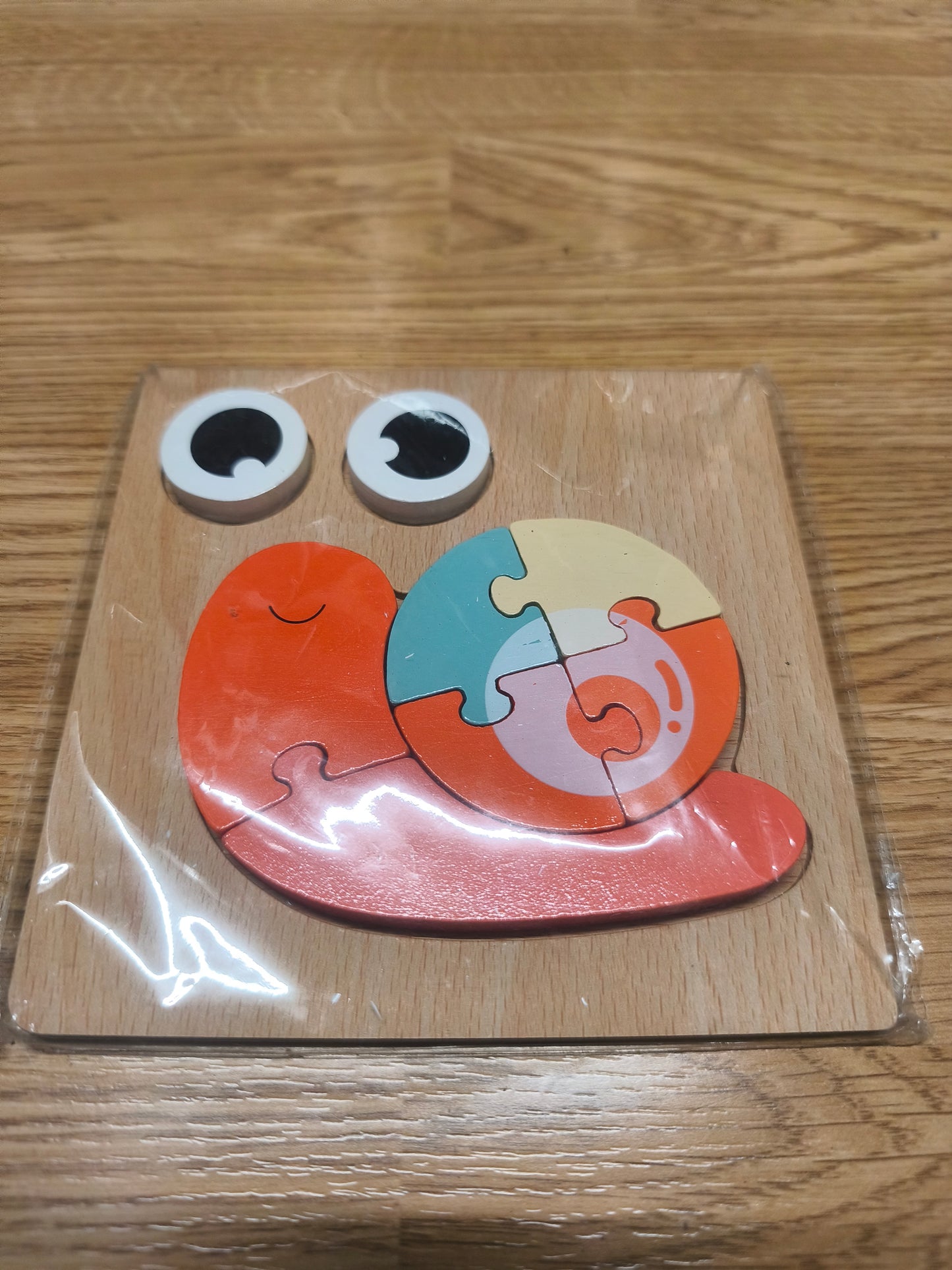Puzzle en bois escargot